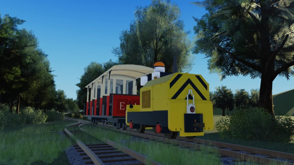 A diesel train pulling a short carriage